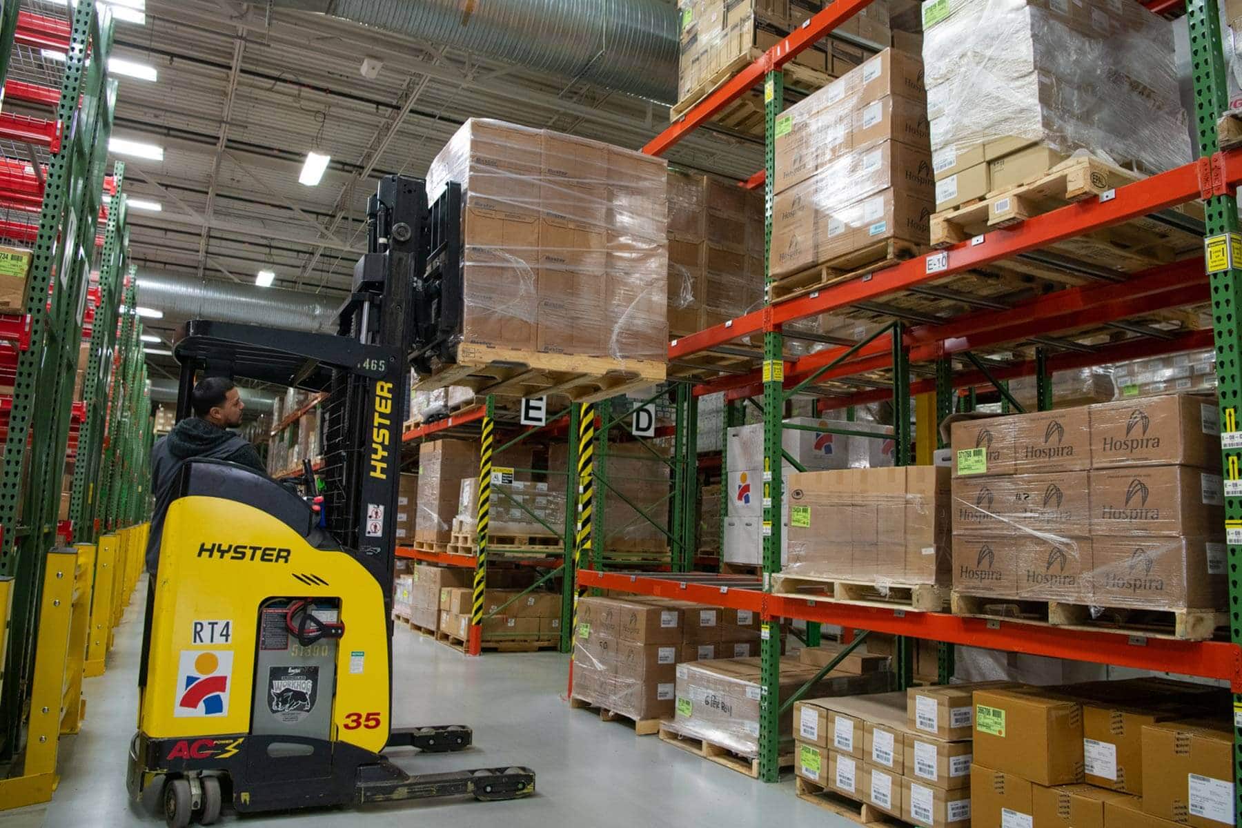 Workers at Americares distribution center in Stamford, Conn., prepare a shipment of life-saving medicine to help families in war-torn Syria. Photo by Chris Williams/Americares