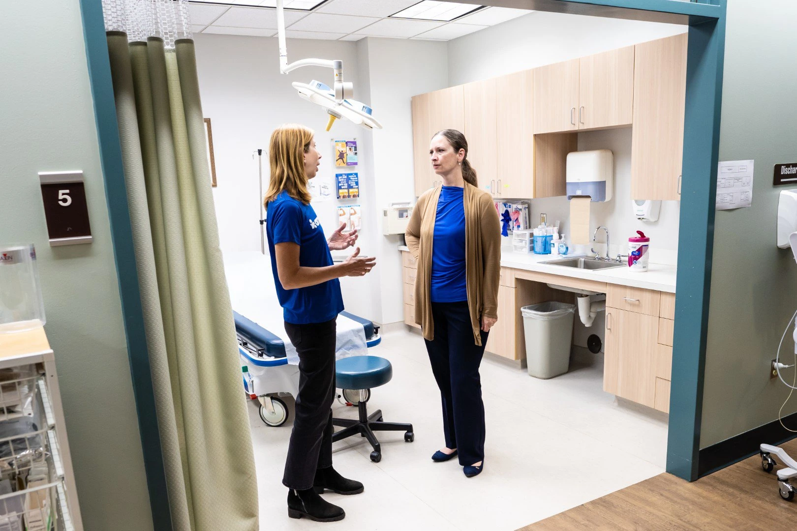 Americares President and CEO Christine Squires (left) meets with Mercy Urgent Care President and CEO Rachel Sossoman (right) in Asheville, N.C. Credit to Andrea Pane/Americares.