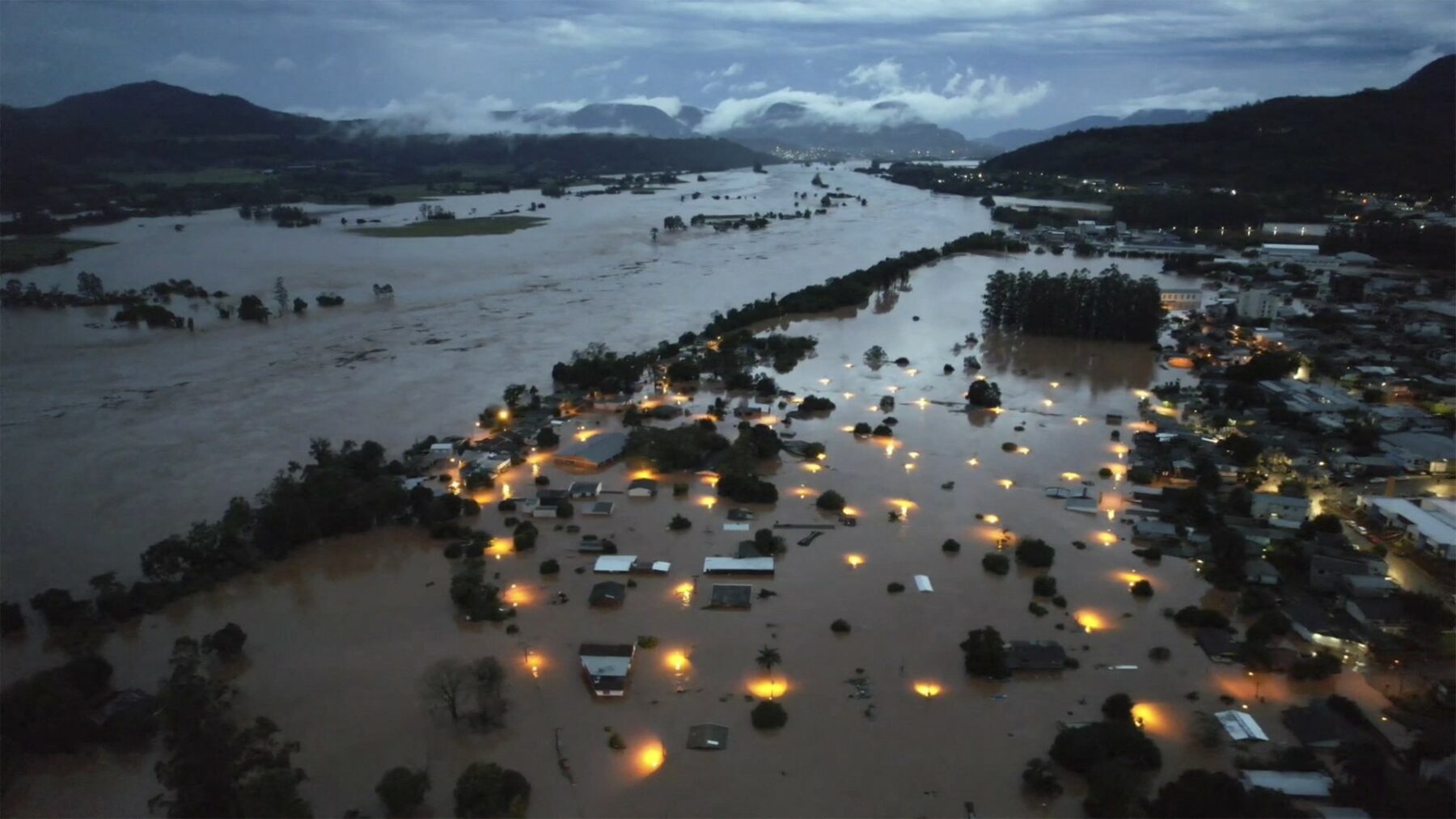 An aerial view shows flooded areas in Encantado city, Rio Grande do Sul, Brazil, on May 1, 2024. Photo by GUSTAVO GHISLENI/AFP via Getty Images.
